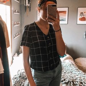 Black and white V-neck tee with buttons